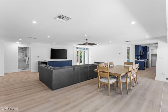 dining room featuring ceiling fan and light hardwood / wood-style flooring