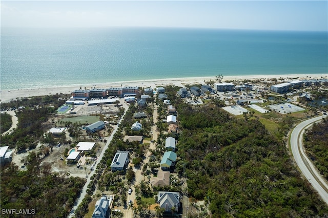 aerial view featuring a water view and a view of the beach