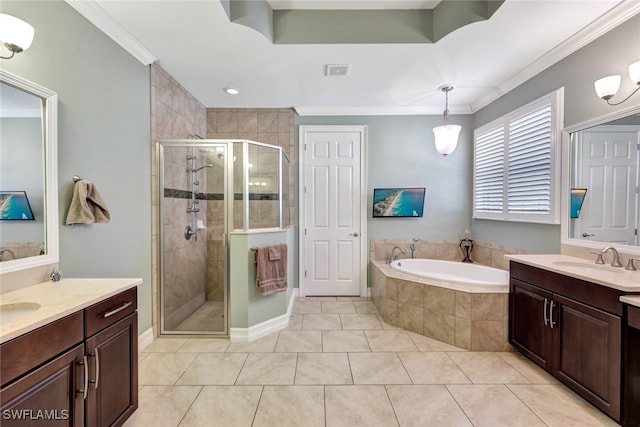 bathroom featuring vanity, tile patterned flooring, plus walk in shower, and ornamental molding