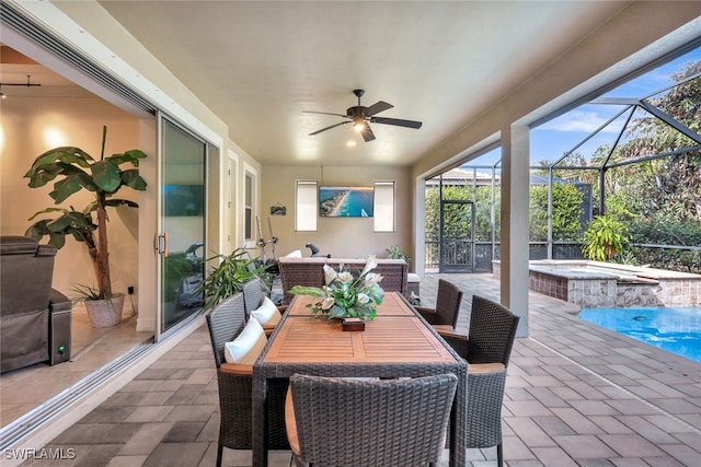 exterior space with a swimming pool and ceiling fan