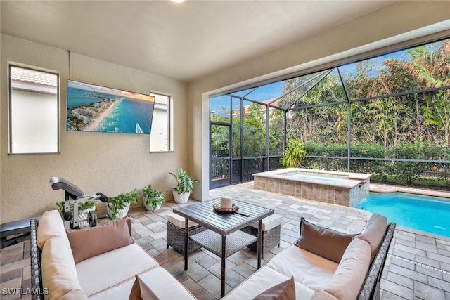 exterior space with a patio, glass enclosure, pool water feature, and an in ground hot tub