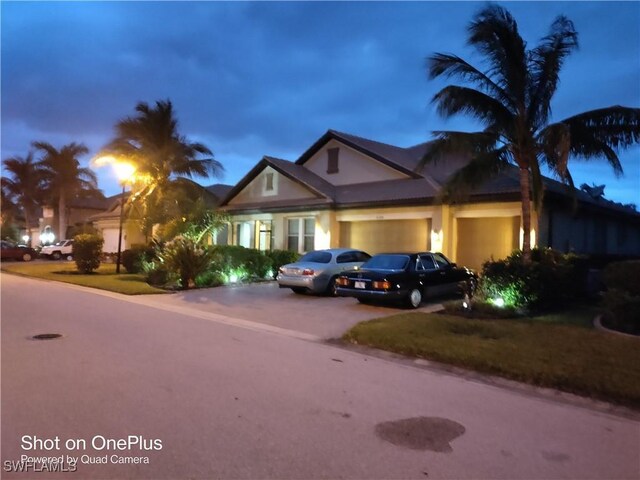 view of front of home with a garage