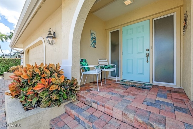 property entrance featuring a garage