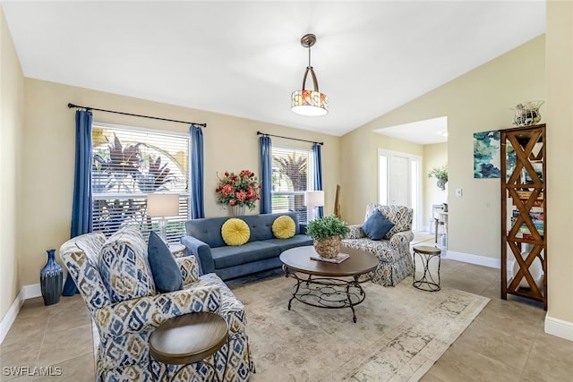 tiled living room with vaulted ceiling