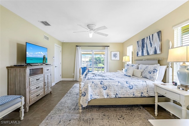 bedroom featuring ceiling fan and tile patterned flooring