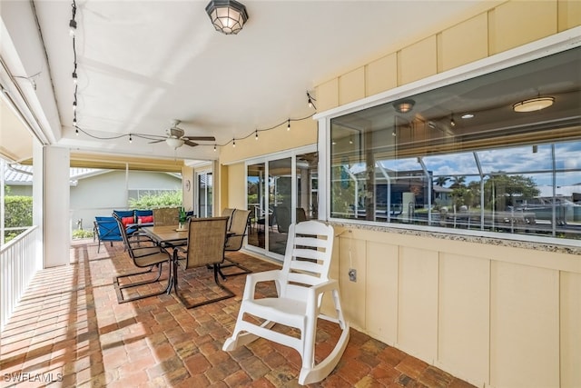 view of patio featuring ceiling fan