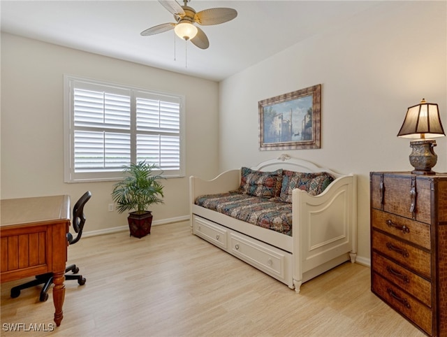 bedroom featuring ceiling fan and light wood-type flooring