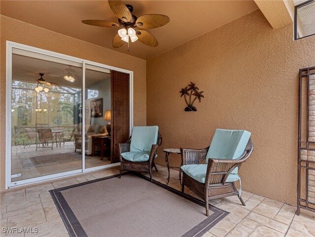 view of patio / terrace featuring ceiling fan