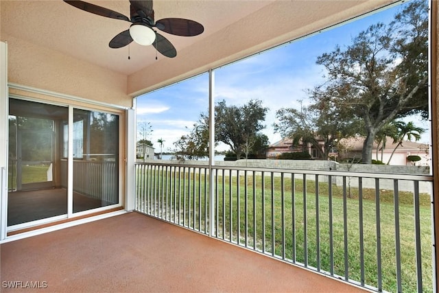 balcony featuring ceiling fan