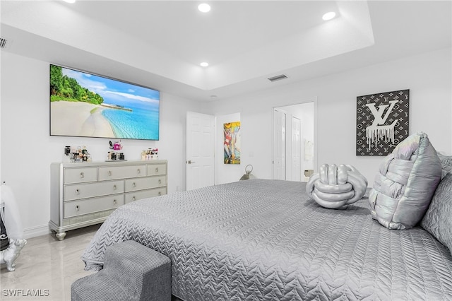 bedroom featuring ensuite bathroom