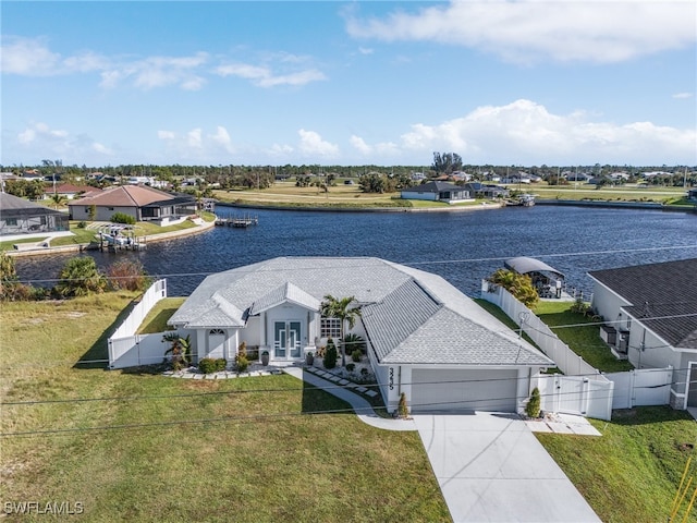 birds eye view of property featuring a water view