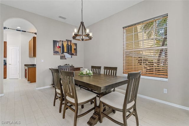 dining area with a chandelier