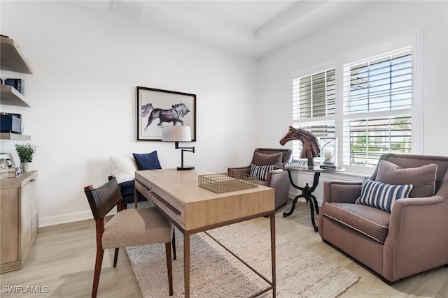 home office with light wood-type flooring