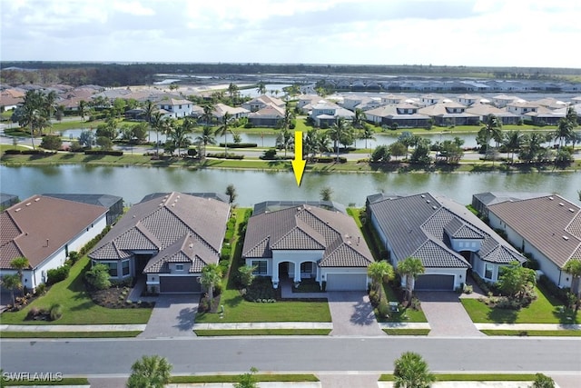 drone / aerial view featuring a water view