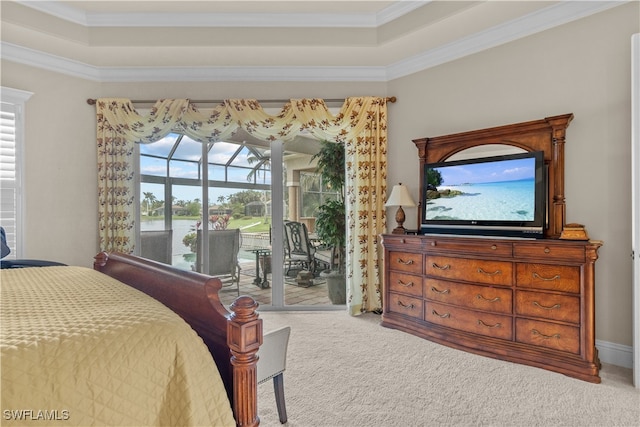 bedroom featuring light colored carpet, ornamental molding, and access to outside