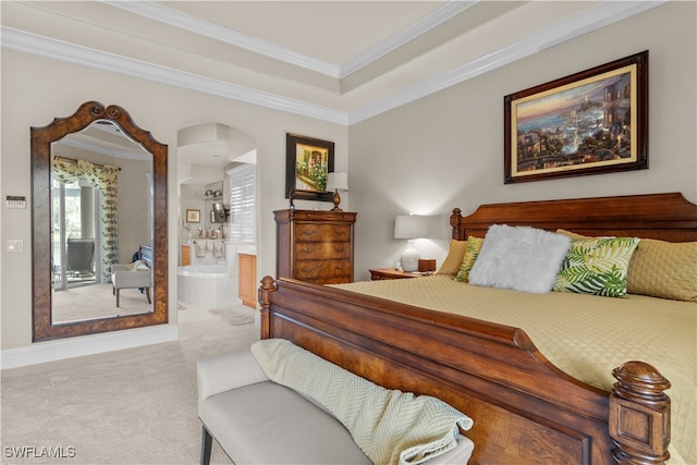 bedroom with ensuite bathroom, carpet floors, and ornamental molding