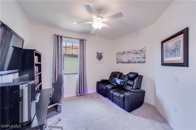 office area featuring ceiling fan and light colored carpet