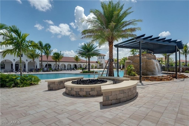 view of swimming pool with a pergola and a patio area