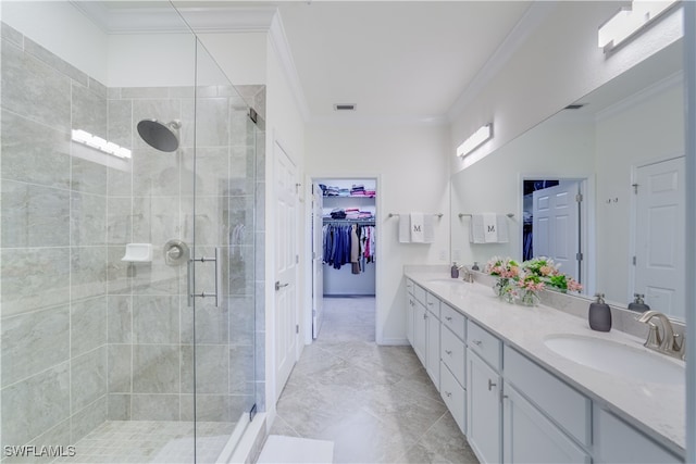 bathroom featuring vanity, ornamental molding, and walk in shower