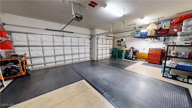 garage featuring a garage door opener