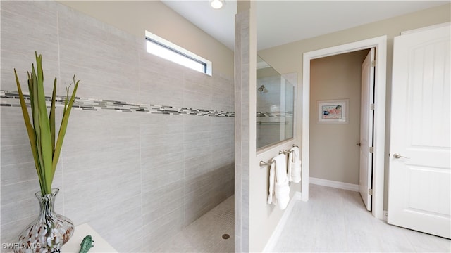 bathroom featuring tiled shower