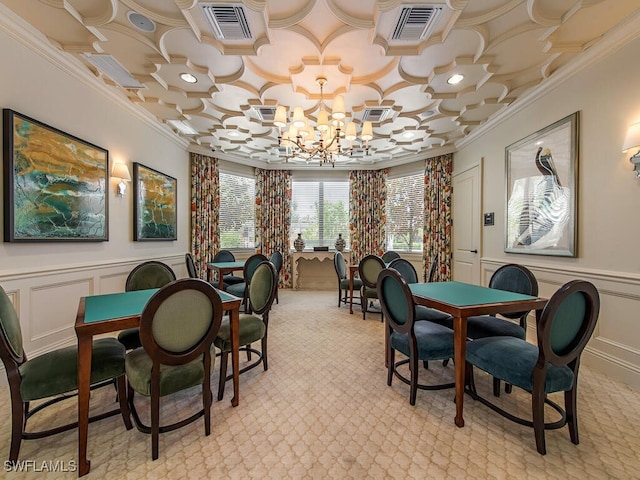 carpeted dining area with an inviting chandelier and ornamental molding