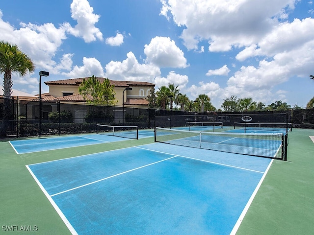 view of sport court featuring basketball hoop