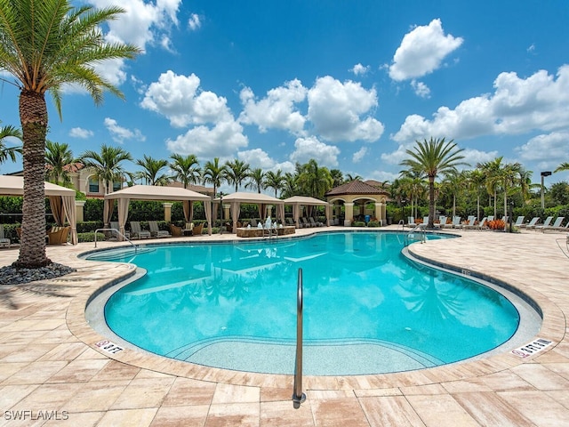 view of pool with a gazebo and a patio