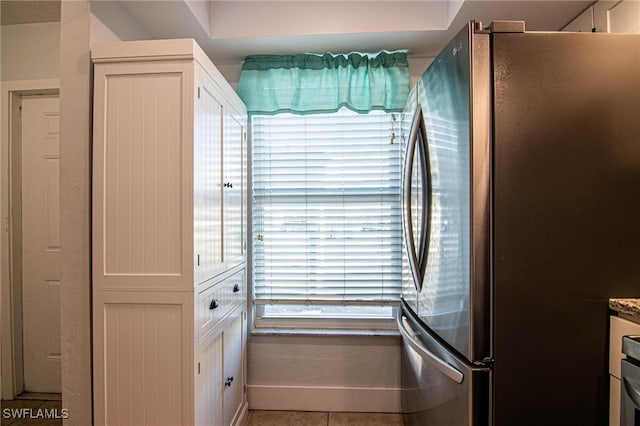 interior space with tile patterned floors