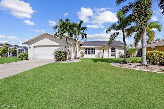 ranch-style house featuring a front yard and a garage