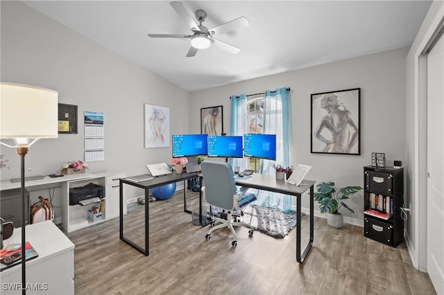 office space featuring hardwood / wood-style floors and ceiling fan