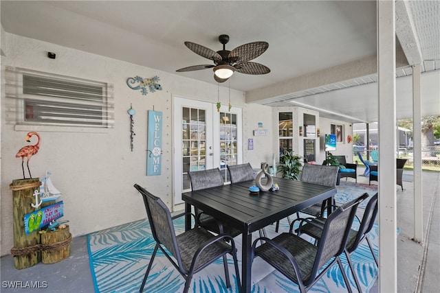 dining room with french doors and ceiling fan