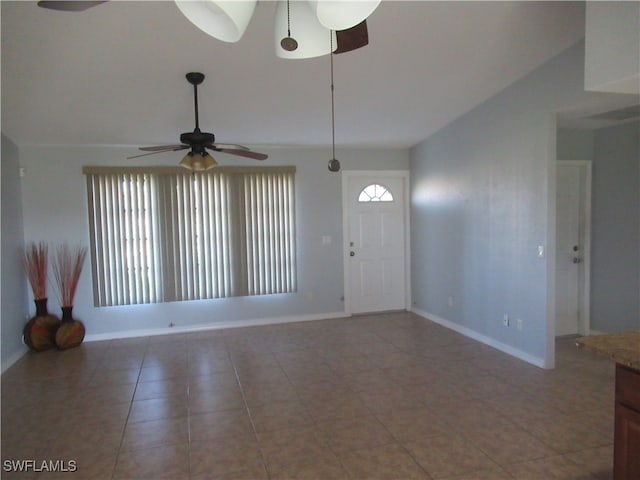 foyer with tile patterned flooring and ceiling fan