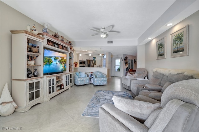 living room with ceiling fan