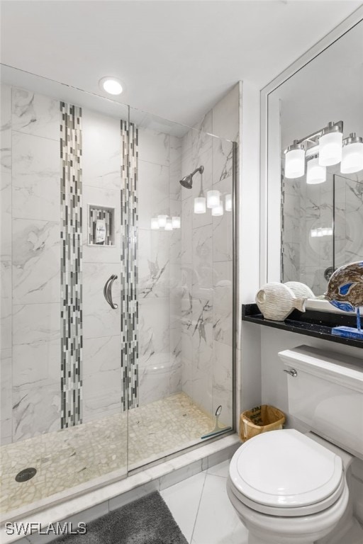 bathroom with tile patterned floors, toilet, and an enclosed shower