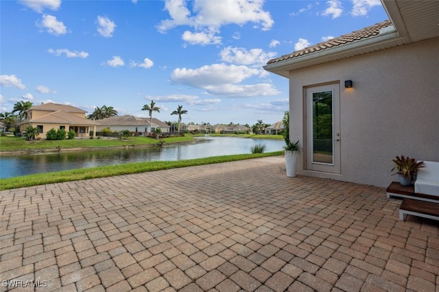 view of patio / terrace featuring a water view