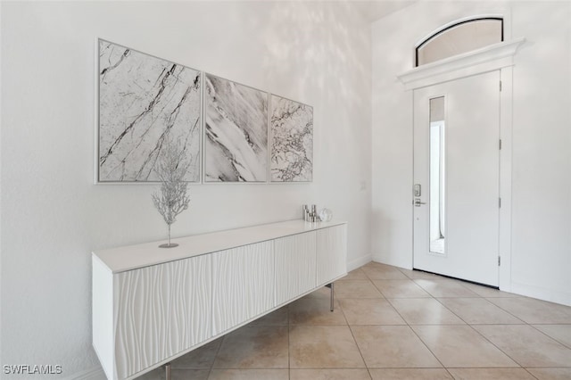 entryway featuring light tile patterned floors