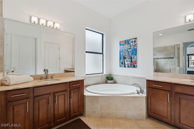 bathroom featuring vanity, separate shower and tub, and tile patterned flooring