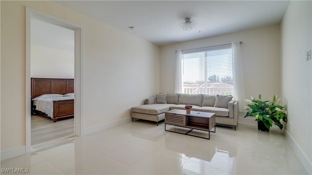 living room featuring light tile patterned flooring