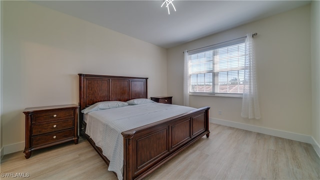 bedroom featuring light hardwood / wood-style floors