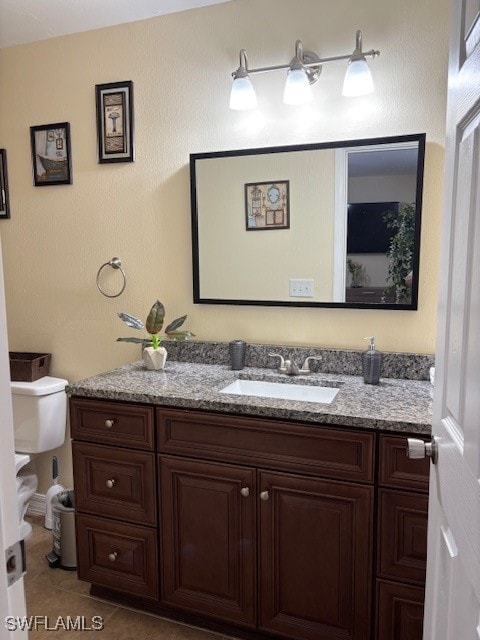 bathroom with vanity and tile patterned floors