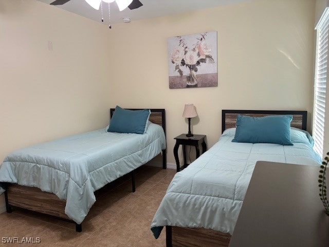 bedroom featuring ceiling fan