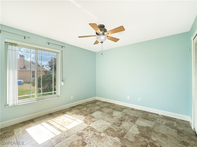 empty room with ceiling fan