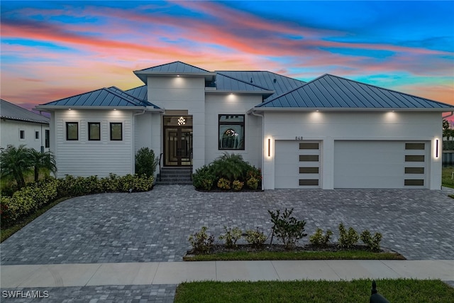 view of front of property featuring a garage