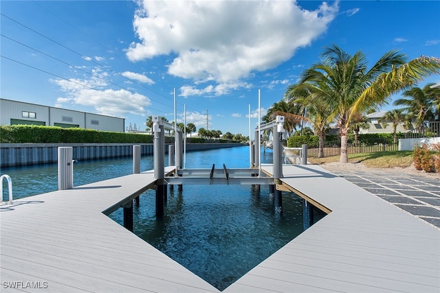 view of dock with a water view