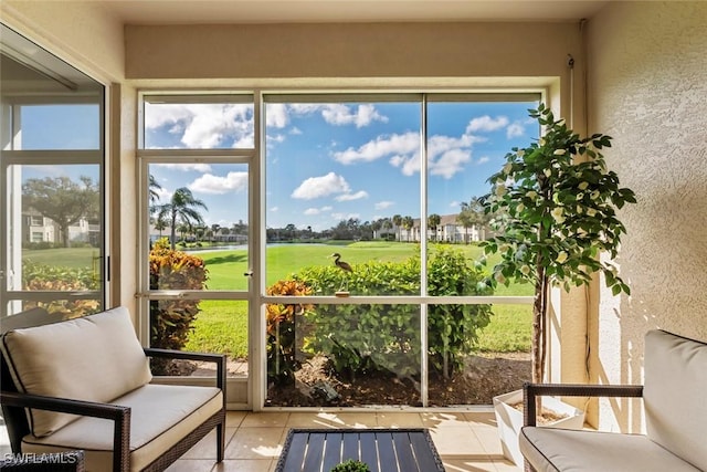 sunroom with plenty of natural light