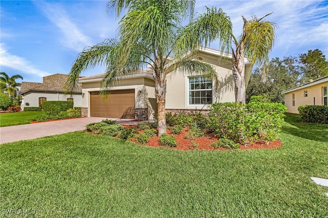 view of front of home featuring a front lawn and a garage