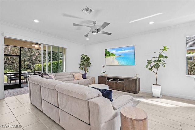 tiled living room with ceiling fan and crown molding