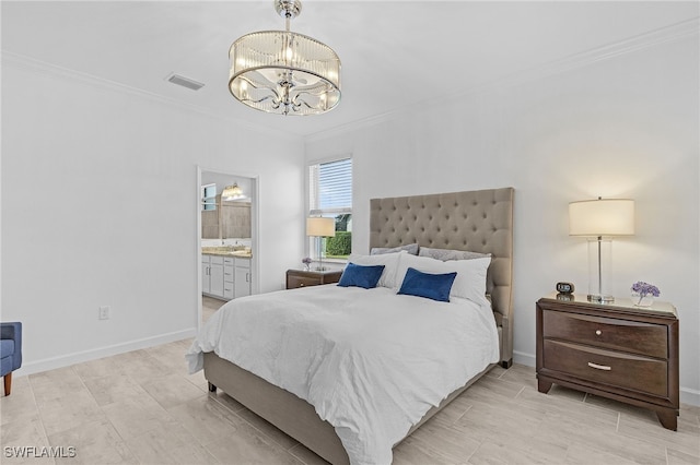 bedroom featuring a chandelier, crown molding, and connected bathroom