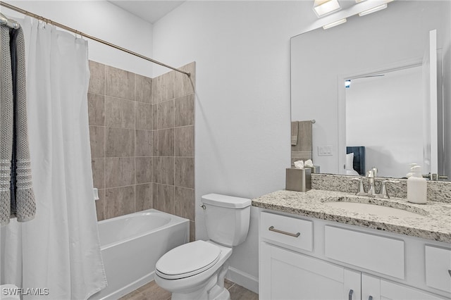 full bathroom featuring toilet, shower / tub combo with curtain, vanity, and wood-type flooring